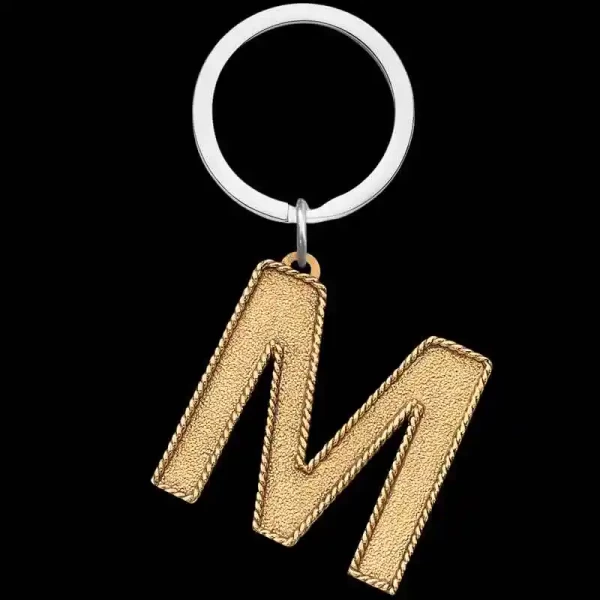 "Everyone's soon-to-be go-to keychain! The Rider Custom Keychain is crafted on a Jeweler's Bronze base with a traditional rope edge. Choose your desired initial below!

Available in Letters A-Z 

Size: 1.5” x 1.4”

Pair with a Discounted Sterli